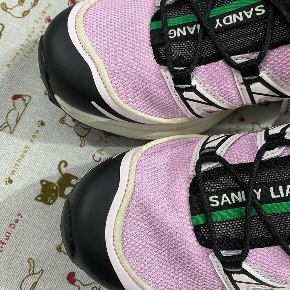 Salomon Women’s Pink and Green Trail Sneakers